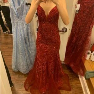 Red Prom dress worn once .. size zero.. no alterations done. Great condition